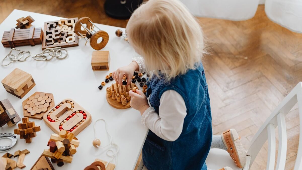 A child doing a hands-on activity, Ages 3-5